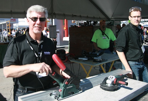 Metabo's Terry Tuerk (L) demonstrates the company's W12-125 HD CED and W12-125 HD CED Plus systems, which create a track saw system for concrete.