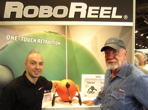 John Tracey (L), director of business operations for Great Stuff, Inc., showed off the RoboReel motorized cord and hose reel system. It was invented by John's father, Jim Tracey (R), who was also working the booth.