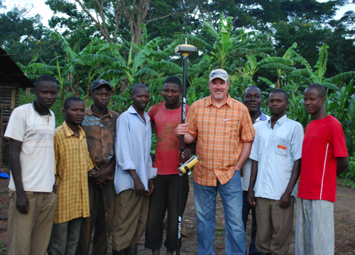 In spring 2011, Ryan Zweerink (center), president of Springfield, Mo.-based Ozark Laser and Shoring, visited several villages that Watoto Child Care Ministries is developing in Uganda to give orphaned children a better life. Zweerink and Ozark provided geospatial and surveying services and instruction.