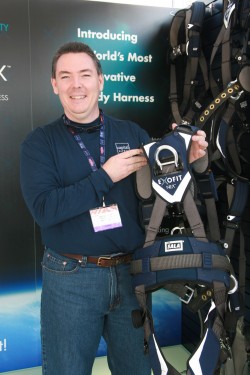 Super snug! Capital Safety's Jeff Halbach points out some of the comfort and safety features of the new top-of-the-line ExoFit NEX full-body harness system.